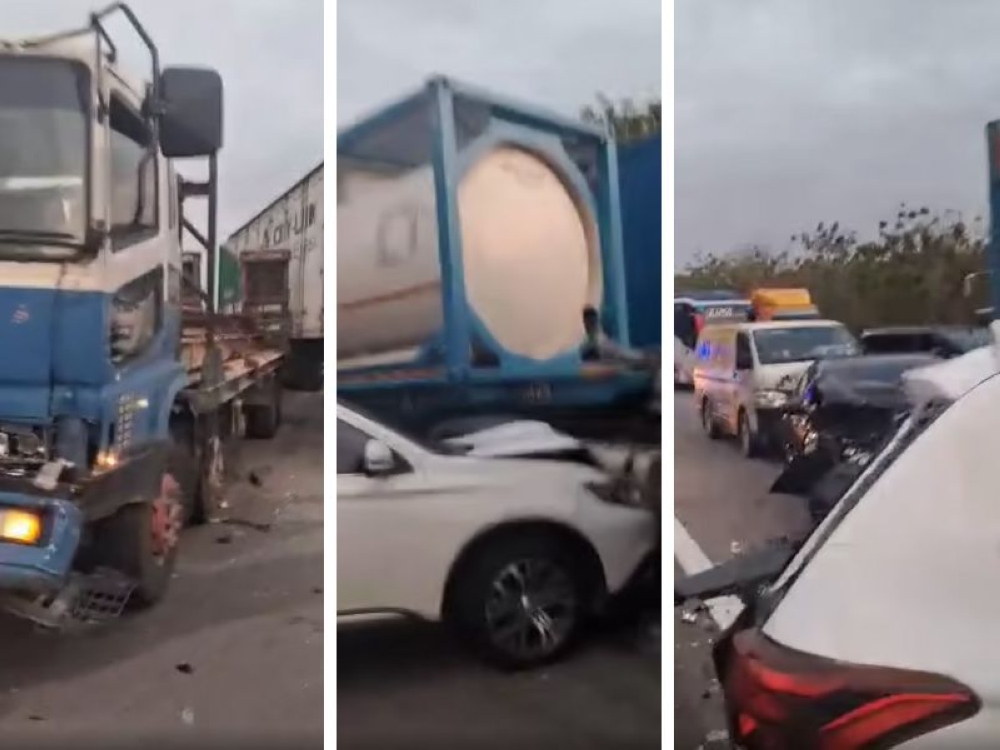 Screenshots from a video of the crash scene shared on social media show the massive 12-vehicle pile-up triggered by a broken down lorry on the highway near Muar, Johor on August 23, 2025 that killed one person.