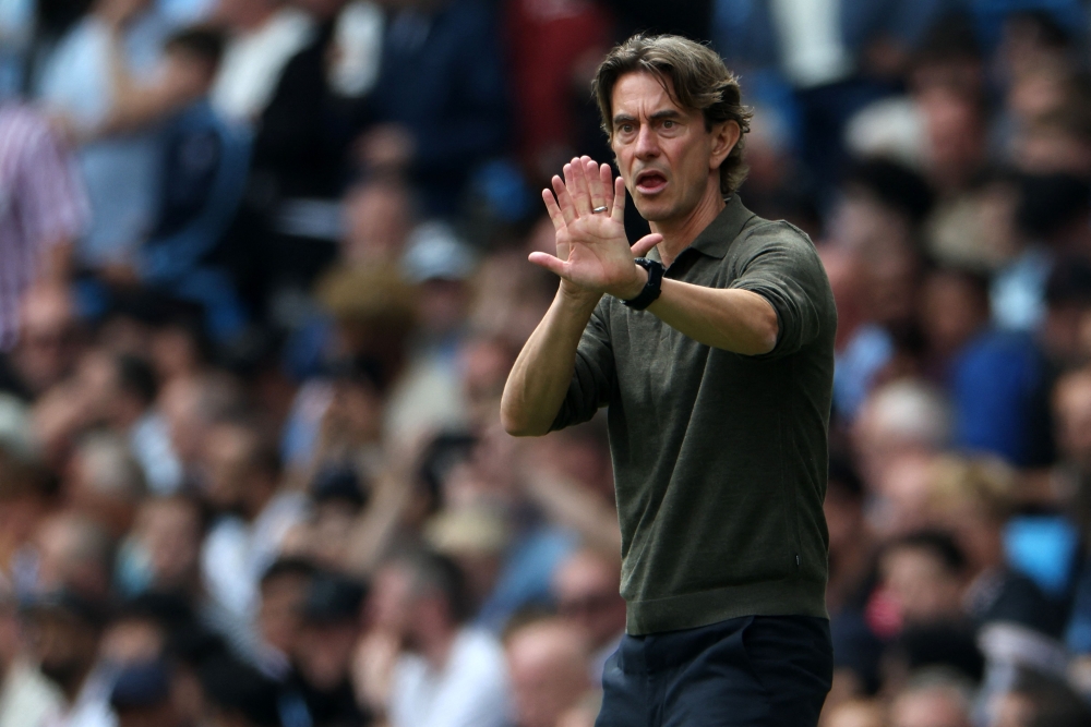 Tottenham Hotspur's Danish head coach Thomas Frank shouts instructions to the players from the touchline during the English Premier League football match between Manchester City and Tottenham Hotspur at the Etihad Stadium in Manchester, north west England, on August 23, 2025. — AFP pic