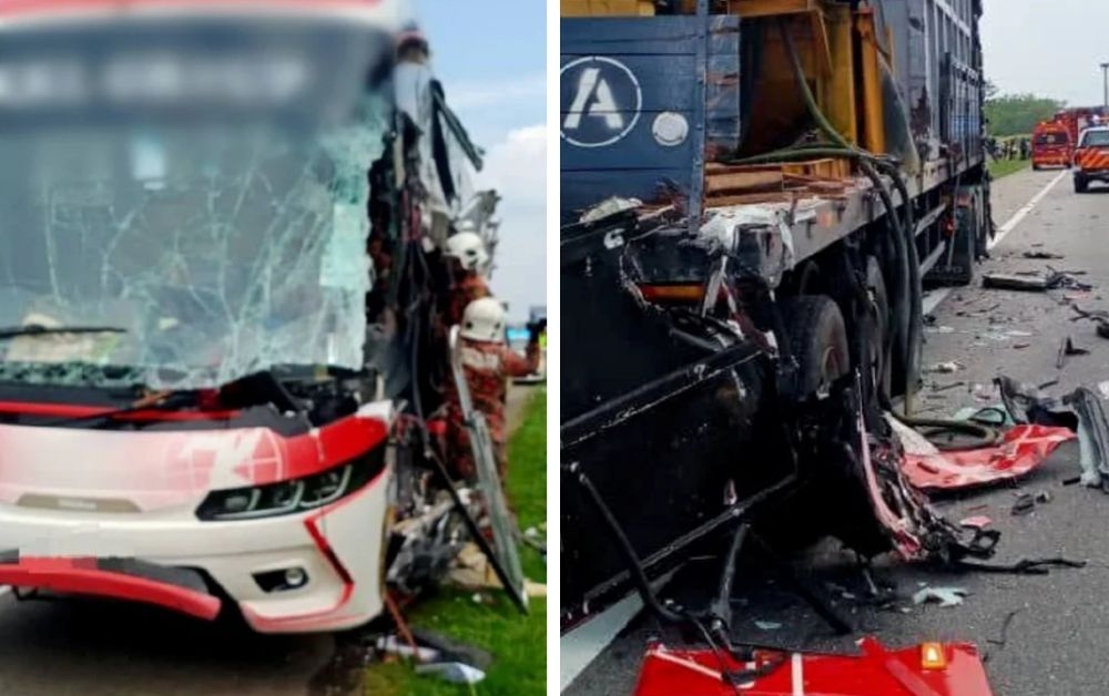 An express bus collided with a trailer at KM152.4 of the North-South Expressway (southbound) near Tangkak today, injuring five people including the driver. — Pictures courtesy of Fire and Rescue Department