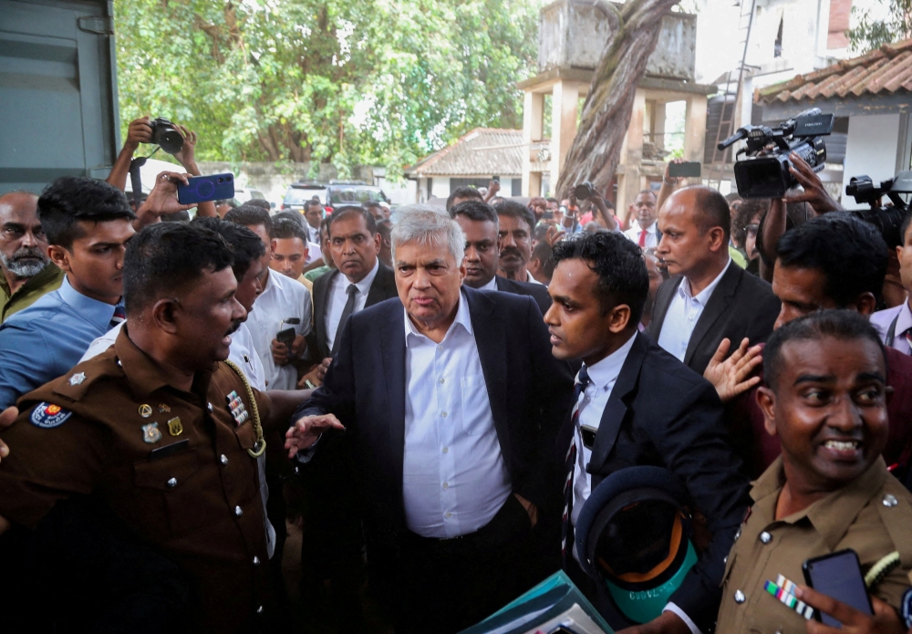 Sri Lanka's former President Ranil Wickremesinghe arrives at the Magistrate’s Court in Colombo, Sri Lanka, August 22, 2025. — Reuters pic