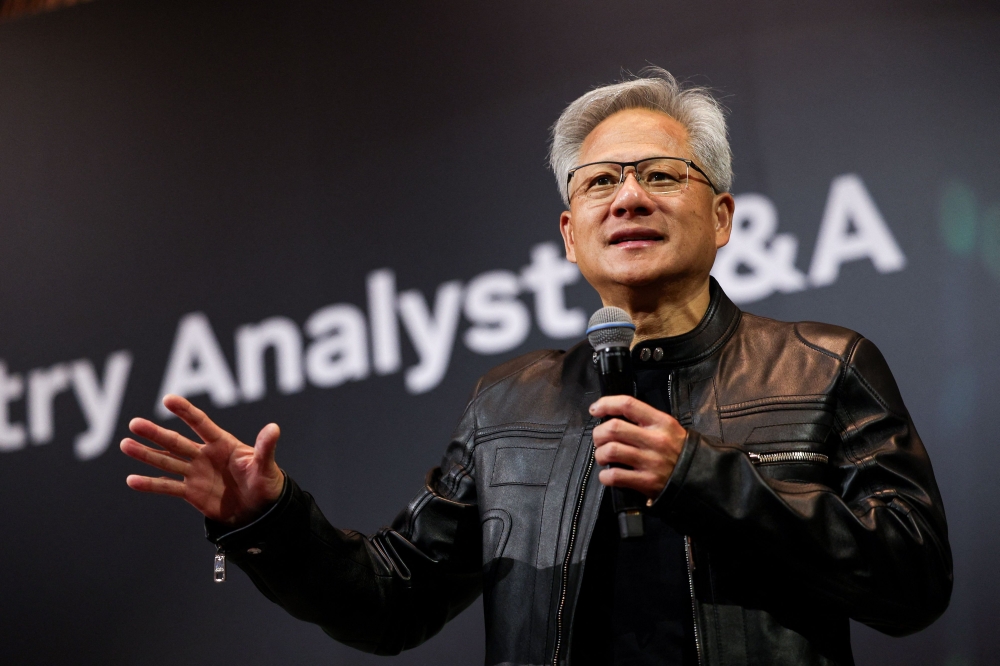 Jensen Huang, the co-founder and chief executive officer of Nvidia Corp., speaks during a news conference in Taipei on May 21, 2025. — AFP pic