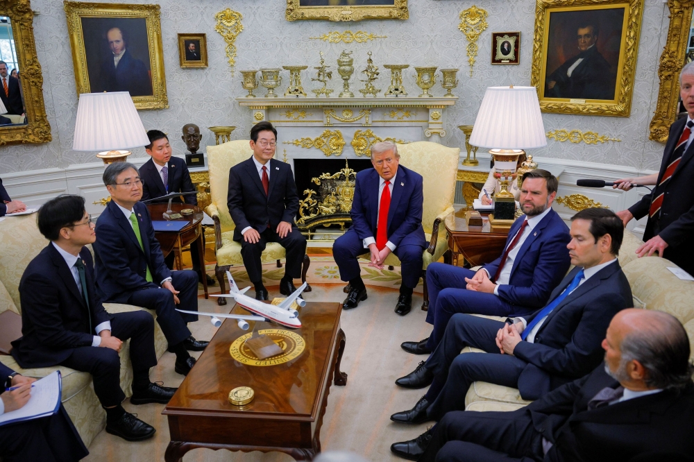US President Donald Trump meets with South Korean President Lee Jae Myung at the Oval Office at the White House in Washington, D.C., on August 25, 2025. — Reuters pic