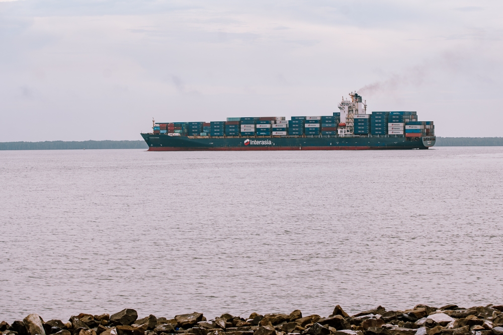 A cargo ship loaded with containers sails off the coast of Klang, April 9, 2025. — Picture by Raymond Manuel