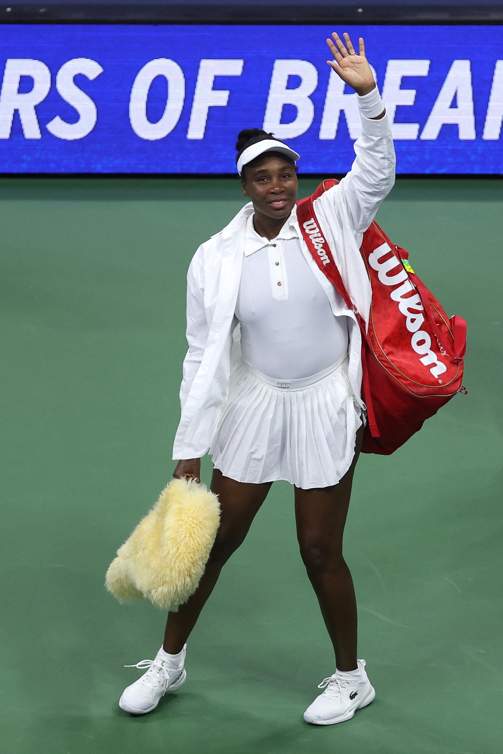 Venus Williams acknowledges the crowd as she leaves the court at USTA Billie Jean King National Tennis Center in New York on August 25, 2025. — AFP pic