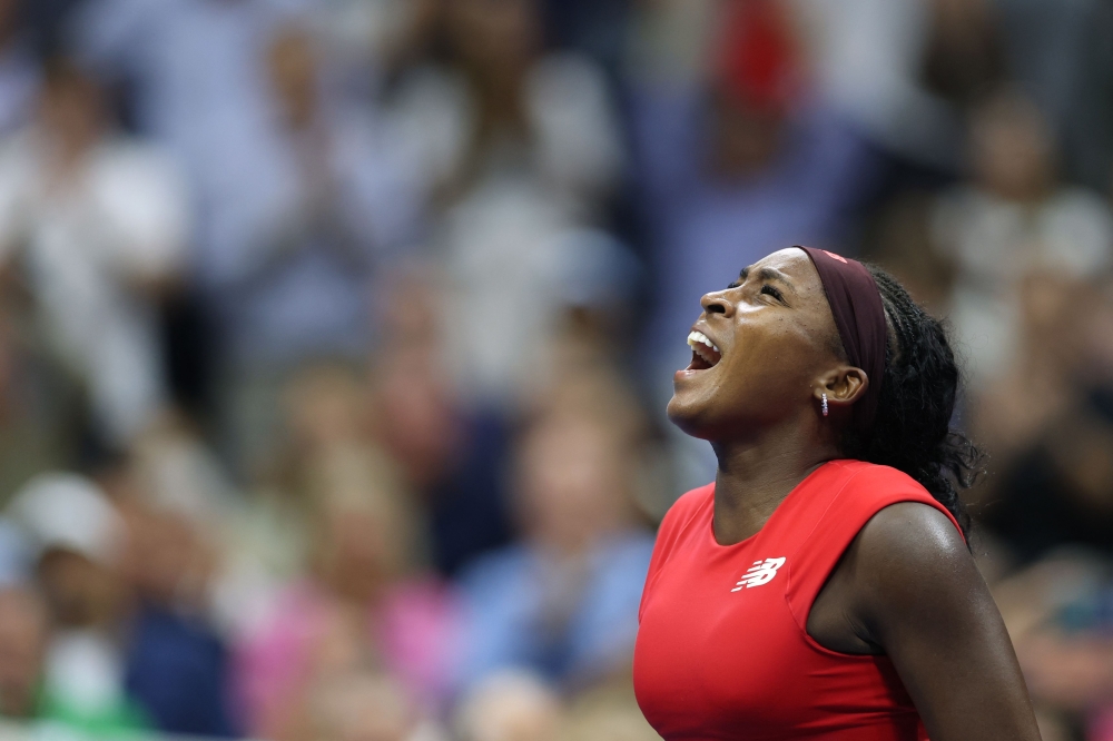 Coco Gauff celebrates after winning her women’s singles first-round match against Ajla Tomljanovic at the US Open in New York August 26, 2025. — AFP pic