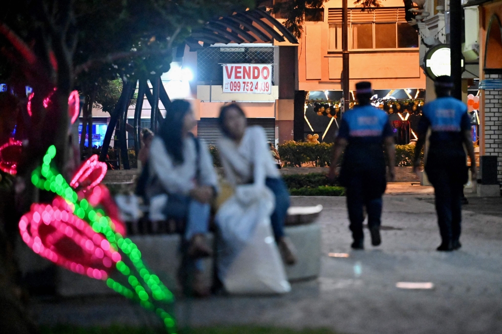 Municipal security officers patrol a street in Guayaquil, Ecuador on August 9, 2025. — AFP pic