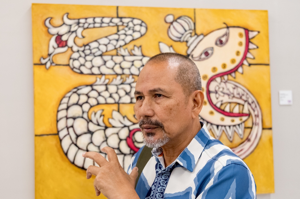 Musician Datuk M. Nasir speaks at the launch of Ruang Teduh art gallery at Exchange 106, Tun Razak Exchange in Kuala Lumpur on August 28, 2025. — Picture by Firdaus Latif