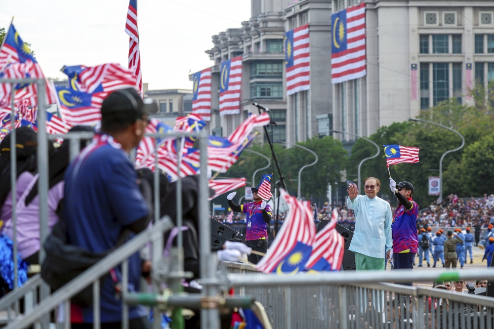Prime Minister Datuk Seri Anwar Ibrahim inspects the full dress rehearsal for the National Day 2025 celebration at Dataran Putrajaya on August 29, 2025. — Bernama pic