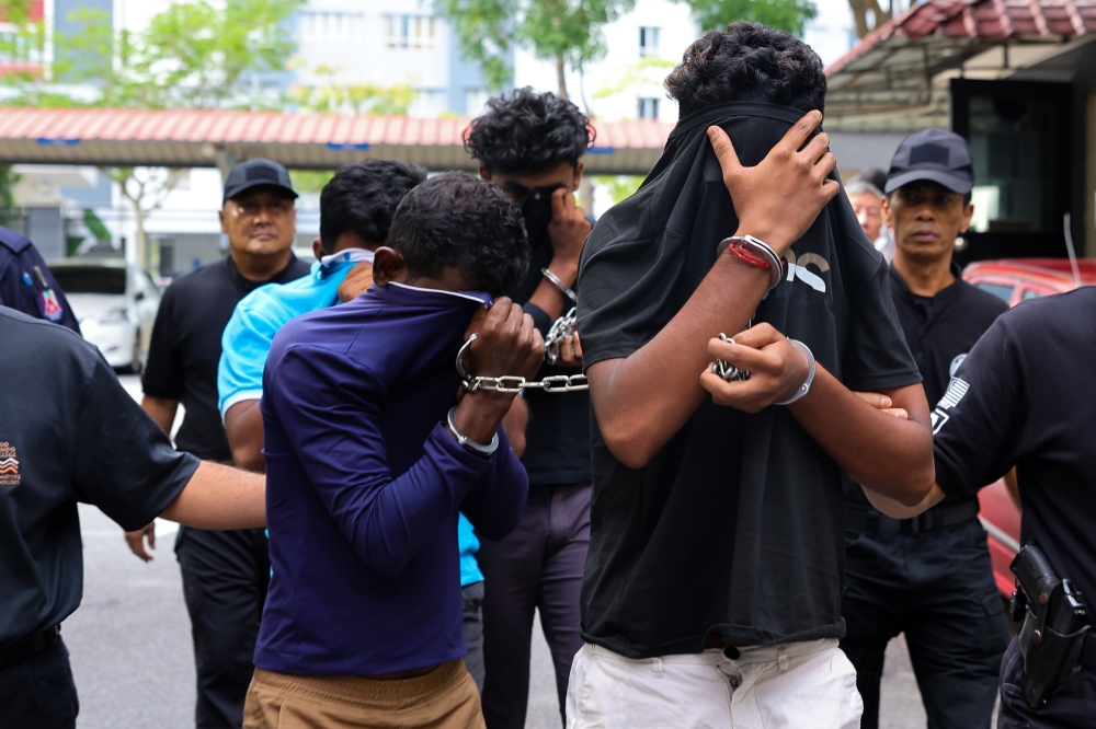 Four men were charged in the Sessions Court here today with the rape of an underage girl in Bahau, Jempol, last Saturday. — Bernama pic