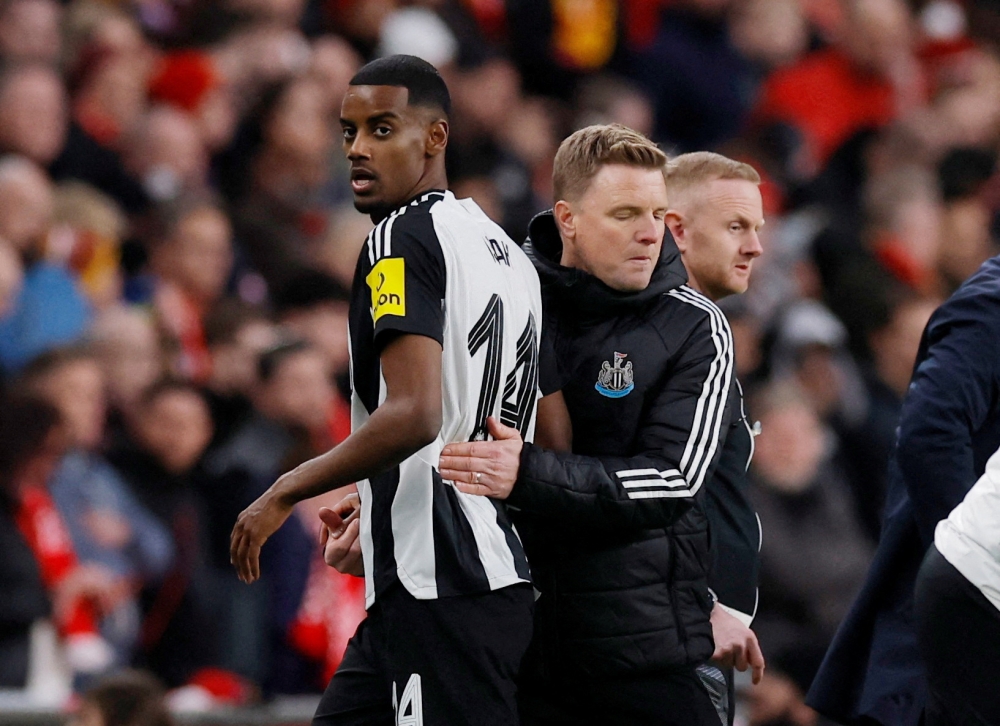 Newcastle United's Alexander Isak with manager Eddie Howe after being substituted during the Carabao Cup final match against Liverpool at Wembley Stadium, London March 16, 2025. — Action Images pic via Reuters/Andrew Couldridge