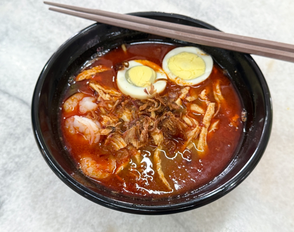 Prawn Mee has a crustacean rich reddish broth you will drink up.