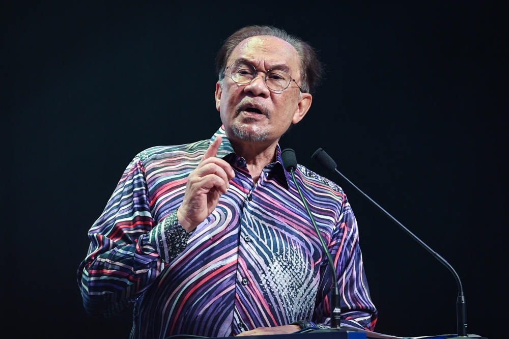 Prime Minister Datuk Seri Anwar Ibrahim delivers his speech at the 2025 National Day address at the Malaysia Agricultural Expo Park (Maeps) in Serdang  August 30, 2025. — Bernama pic