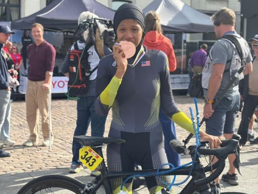Malaysian Nuraini Mohamad Shukri celebrates after winning bronze in the Individual Time Trial WC1 at the 2025 Para Cycling Road World Championships in Ronse, Belgium on August 30, 2025. — Picture from Facebook/Majlis Sukan Negara