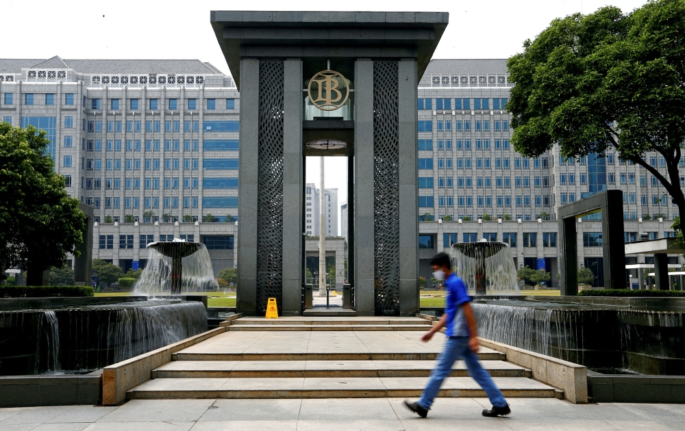 File picture of a man walking past Bank Indonesia headquarters in Jakarta, Indonesia, September 2, 2020. Indonesia’s central bank unexpectedly announced a cut in its key interest rate on Wednesday in a bid to boost economic growth just days after President Prabowo Subianto touted an expectation-defying economy. — Reuters pic