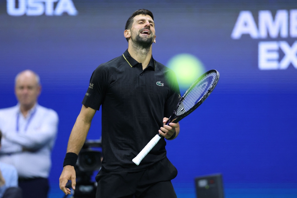Serbia’s Novak Djokovic reacts during his US Open third-round match against Britain’s Cameron Norrie on August 29, 2025. — AFP pic