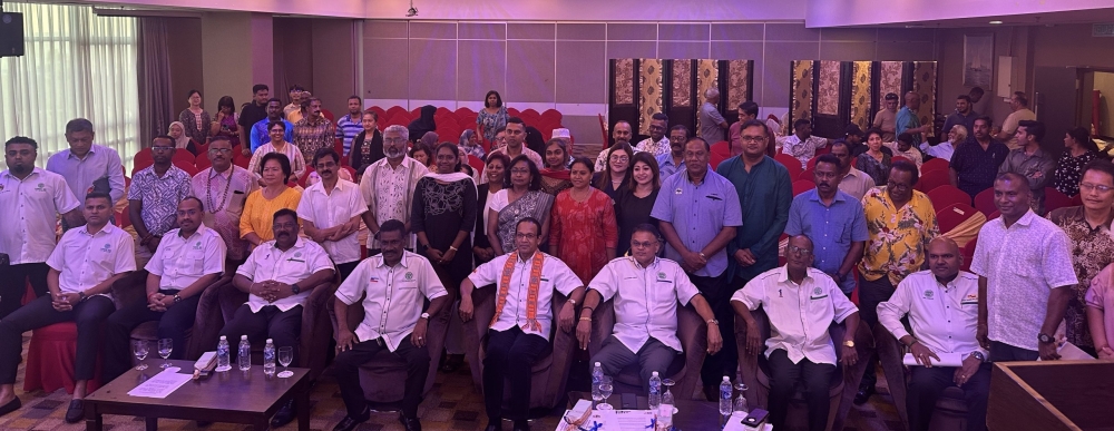 Murugiah (seated fifth left) with Peer on his left at the Sabah MIC Convention in Kota Kinabalu on August 30, 2025. — The Borneo Post pic