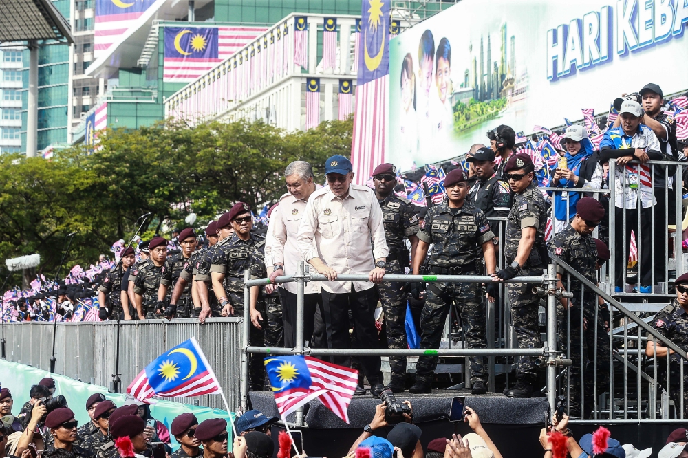 Prime Minister Datuk Seri Anwar Ibrahim and other VIPs visit the student formation display during the 68th National Day celebration in Putrajaya.