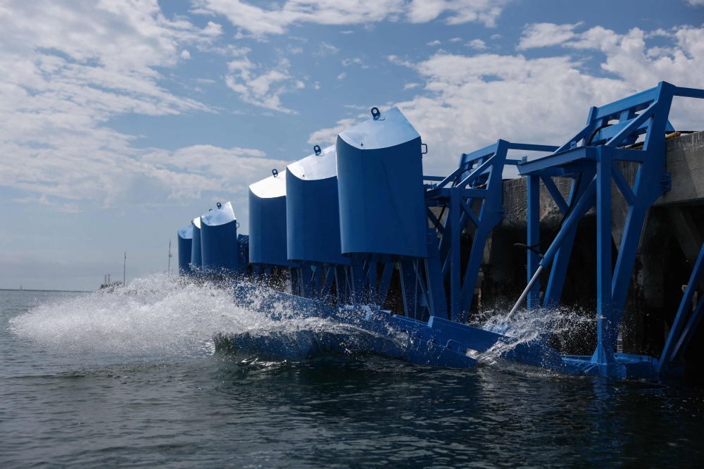 Floaters are released into the water during a demonstration of Eco Wave Power electricity generation technology using the power of ocean waves in the harbor at AltaSea at the Port of Los Angeles in San Pedro, California, August 26, 2025. — AFP pic
