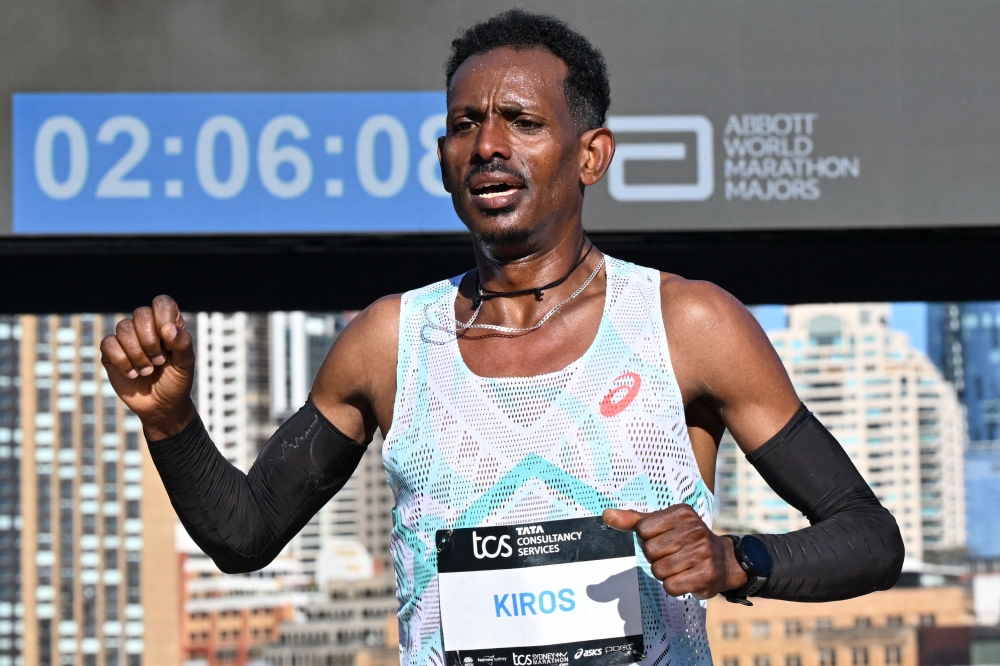 Ethiopia’s Hailemaryam Kiros crosses the finish line first in the 2025 Sydney Marathon, crossing the iconic Harbour Bridge on August 31, 2025. — AFP pic