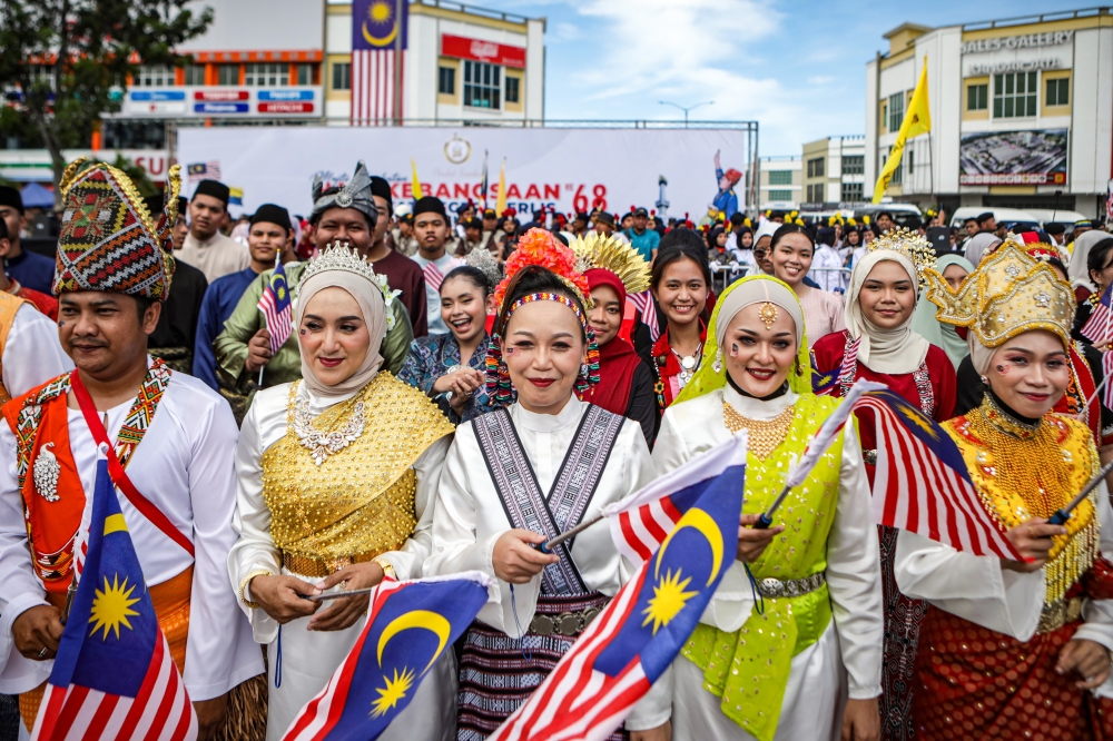 Participants wear traditional attire during the Merdeka Parade in Kangar Jaya, Perlis on August 31, 2025. — Bernama pic
