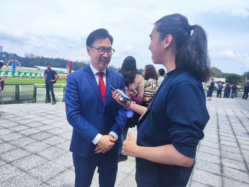 STC chief executive Datuk Michael Fong Chee Poong speaks to Malay Mail during the Merdeka Cup. — Picture by Kenneth Tee