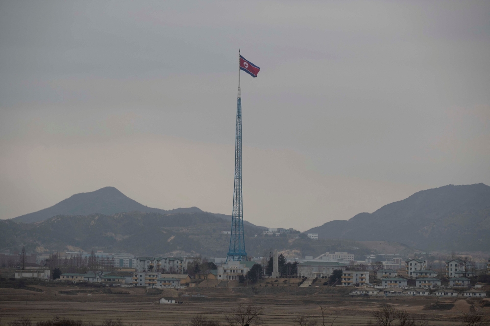 North Korean propaganda village ‘Gijungdong’ is seen from a South Korea observation post inside the Joint Security Area (JSA) during a media tour of the Demilitarised Zone (DMZ) in the border village of Panmunjom in Paju, South Korea, March 3, 2023. — Reuters pic