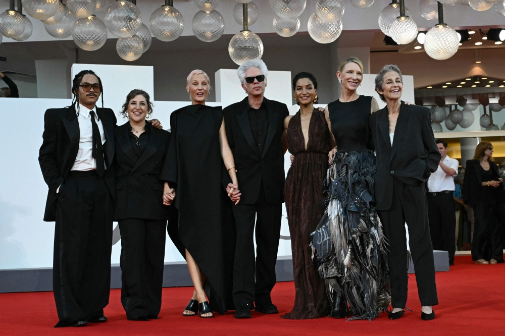 US actor Luka Sabbat, US actress and neuroscientist Mayim Bialik, Luxembourg actress Vicky Krieps, US film director Jim Jarmusch, US actress, model Indya Moore, Australian US actress Cate Blanchett and British actress Charlotte Rampling attend the red carpet for the movie 'Father Mother Sister Brother' presented in competition at the 82nd International Venice Film Festival, at Venice Lido on August 31, 2025. — AFP pic
