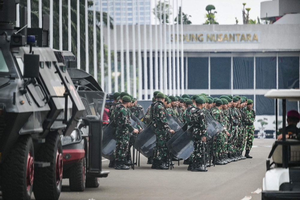 ndonesian Army soldiers gather at the parliament complex in Jakarta on September 1, 2025. — AFP pic