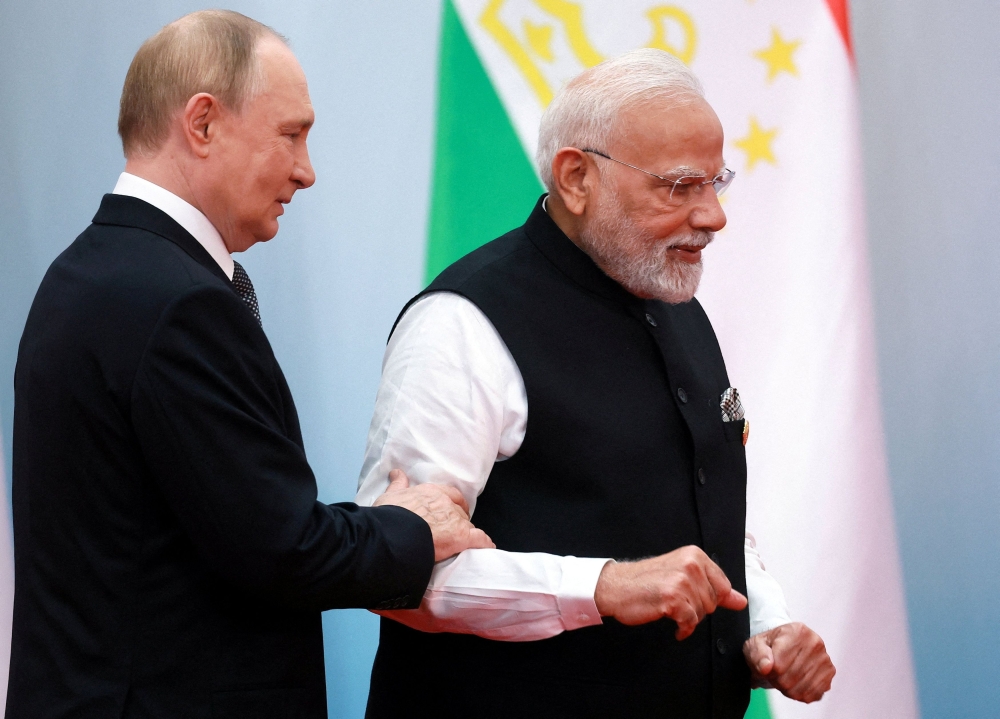 Russian President Vladimir Putin and Indian Prime Minister Narendra Modi attend a photo ceremony at the Shanghai Cooperation Organisation (SCO) summit in Tianjin September 1, 2025. Sputnik/Vladimir Smirnov/Pool via Reuters