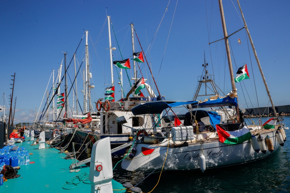 Sailboats from the Global Sumud Flotilla humanitarian expedition prepare to set sail for Gaza at the port of Barcelona, Spain, August 30, 2025. — Reuters pic 