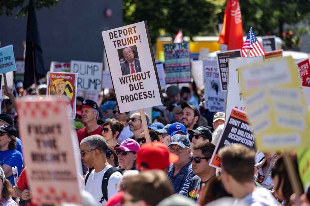 People participate in a Labor Day protest in Chicago, Illinois, US, September 1, 2025. Protesters march through the streets in anticipation of DHS agents coming to Chicago to enforce immigration raids. — Reuters pic 