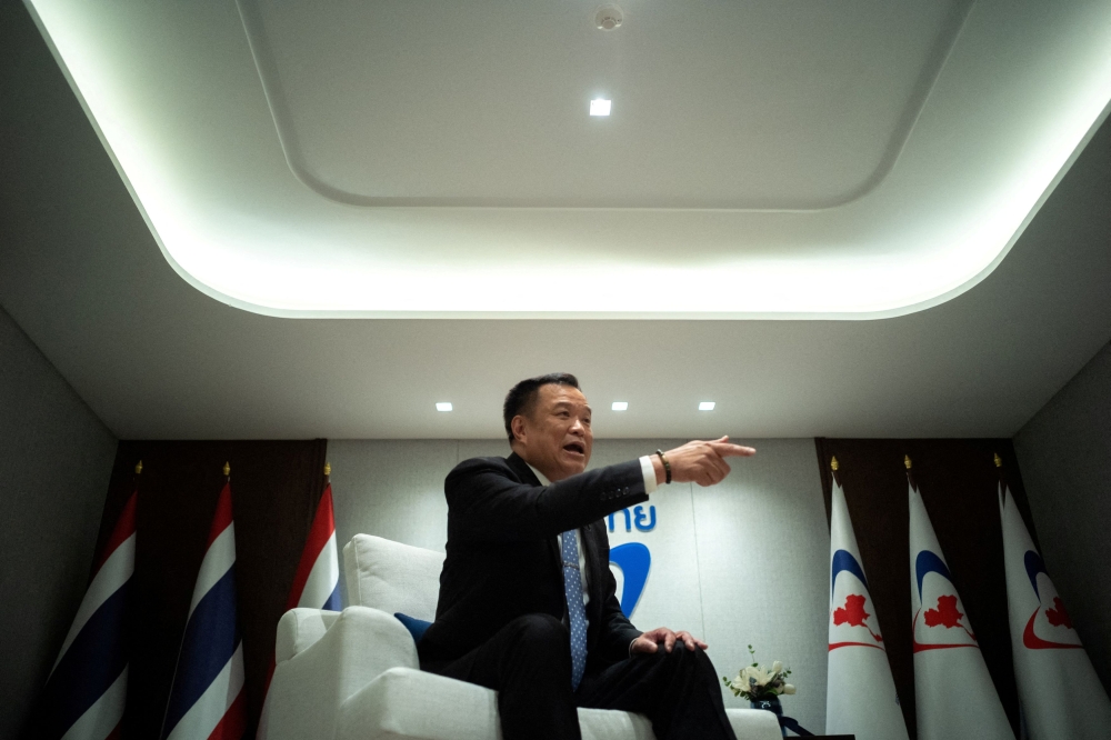 In this file photo taken on April 10, 2023, Bhumjaithai Party leader and prime ministerial candidate Anutin Charnvirakul speaks during an interview with Reuters in Bangkok. — Reuters pic