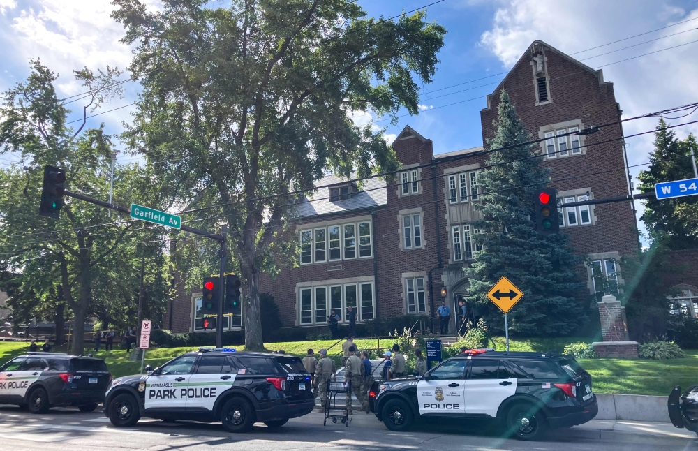 Police and first responders work at the scene of a shooting near Annunciation Church and Catholic School in Minneapolis, Minneosta Aug 27, 2025. — AFP pic