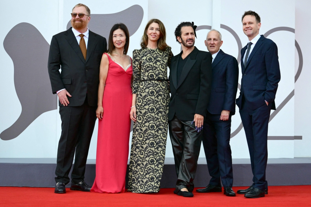 (From left) US filmmaker and documentarian RJ Cutler, US producer Jane Cha Cutler, US director Sofia Coppola, US designer Marc Jacobs, Chad Sipkin and Trevor Smith attend the photocall of the movie ‘Marc by Sofia’ presented out of competition at the 82nd International Venice Film Festival, at Venice Lido on Sepember 2, 2025. — AFP pic