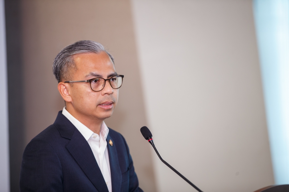 Communications Minister Datuk Fahmi Fadzil speaking to reporters at the weekly post-Cabinet press conference here. — Picture by Raymond Manuel