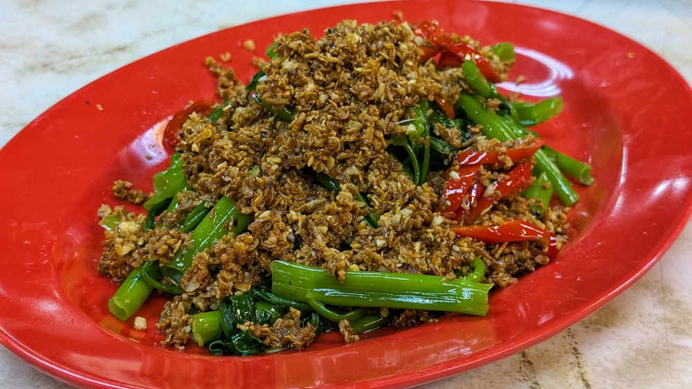 How many other restaurants do you know of that have ‘kangkung’ as a signature, prepared this way? — Picture by Ethan Lau