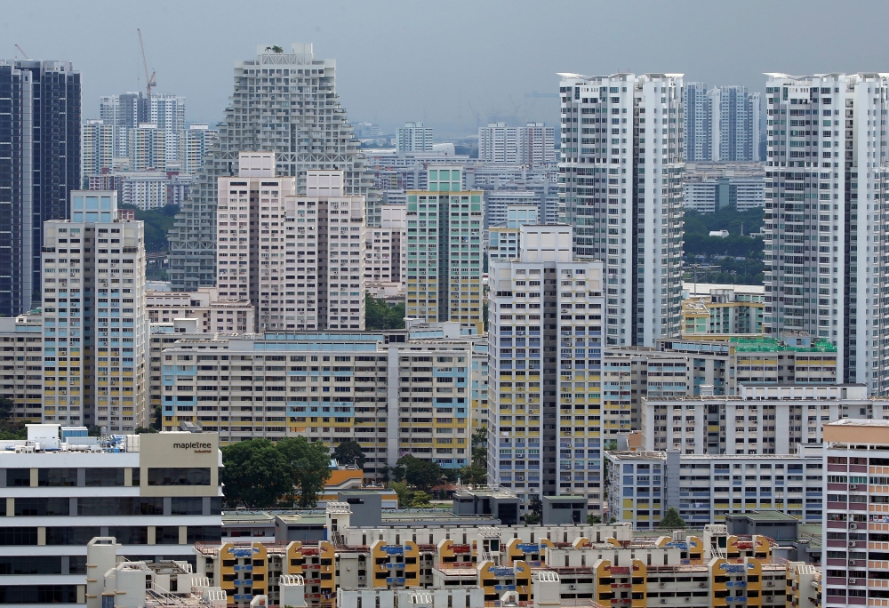 A view of private residential apartments and public housing estates in Singapore. Johor police confirmed today that there have been no fraud reports linked to an alleged Johor-Singapore housing subsidy, urging public to stay alert against scams. — Reuters pic
