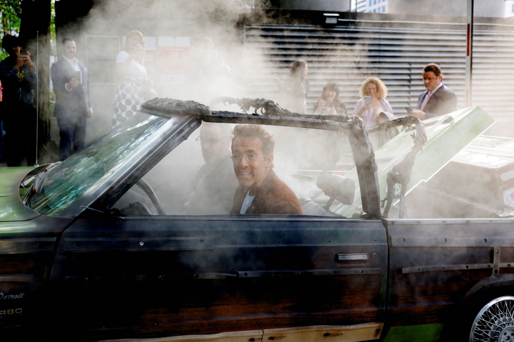 Director Colin Hanks and producer Ryan Reynolds pose inside a replica car from the film ‘Planes, Trains and Automobiles’ on the day of the premiere of the documentary film ‘John Candy: I Like Me’ as the Toronto International Film Festival (TIFF) returns for its 50th edition in Toronto September 4, 2025. — Reuters pic