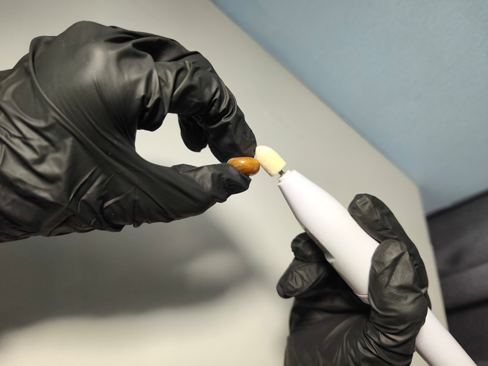 A completed MBALL being sanded to smoothen the resin surface before a resin polish compound is added for shine. — Picture courtesy of Tan Chee Kheng/MBALL