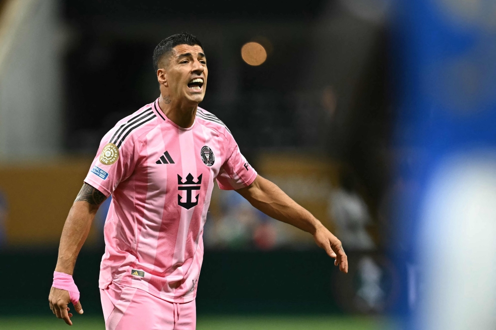 Inter Miami's Uruguayan forward #09 Luis Suarez reacts during the FIFA Club World Cup 2025 Group A football match between US Inter Miami and Portugal's FC Porto at the Mercedes-Benz stadium in Atlanta on June 19, 2025. Inter Miami star Luis Suarez has been handed a six-match suspension for his actions following this stormy Leagues Cup final defeat to the Seattle Sounders, tournament disciplinary chiefs said yesterday. — AFP pic 