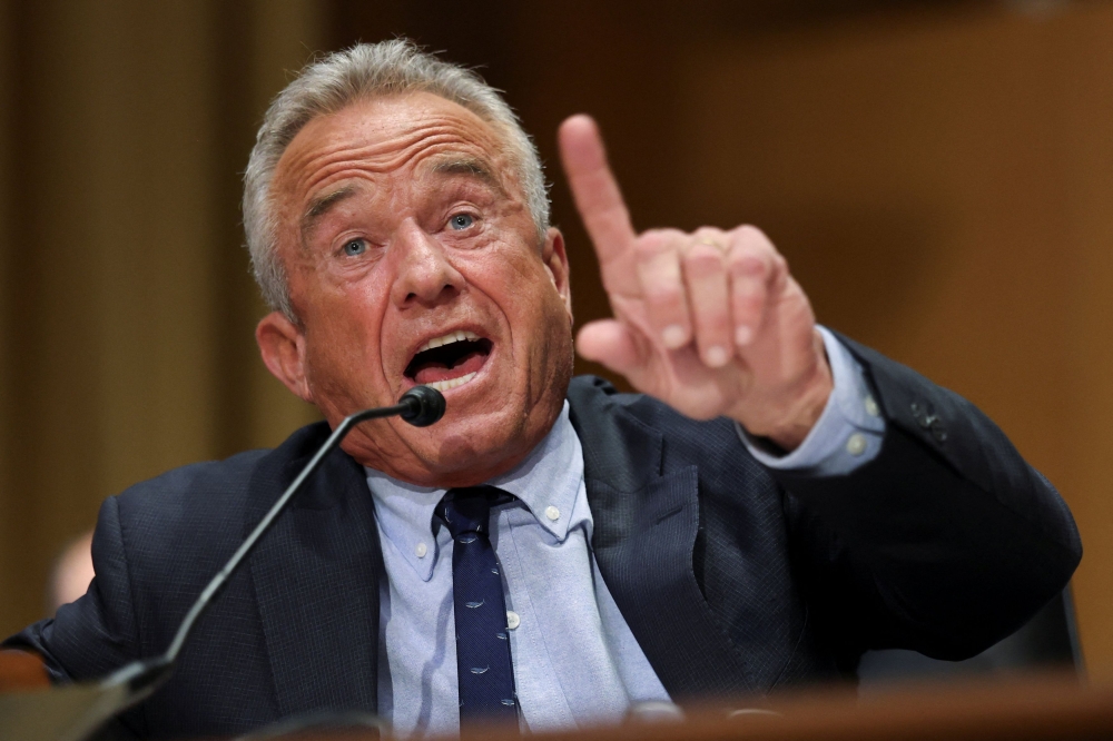 US Health and Human Services Secretary Robert F Kennedy Jr has slashed funding for vaccine research, limited access for Covid-19 shots and ousted the head of the Centres for Disease Control and Prevention. — Reuters pic