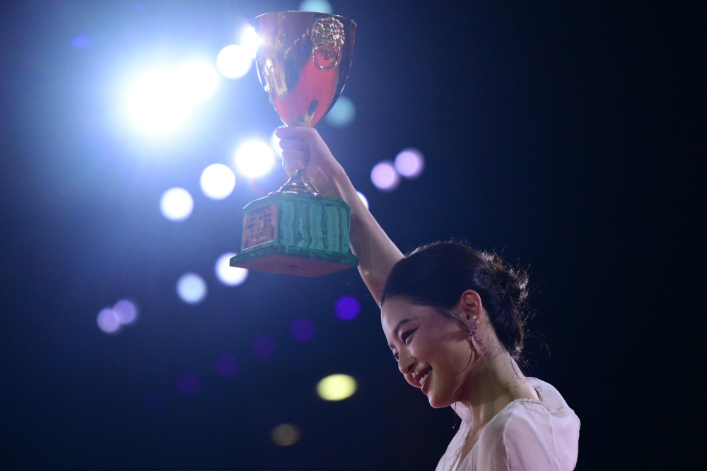 Xin Zhilei poses with the Coppa Volpi for Best Actress she received for her part in ‘Ri Gua Zhong Tian (The Sun Rises on Us All)’ after the award ceremony of the 82nd Venice Film Festival September 6, 2025. — AFP pic
