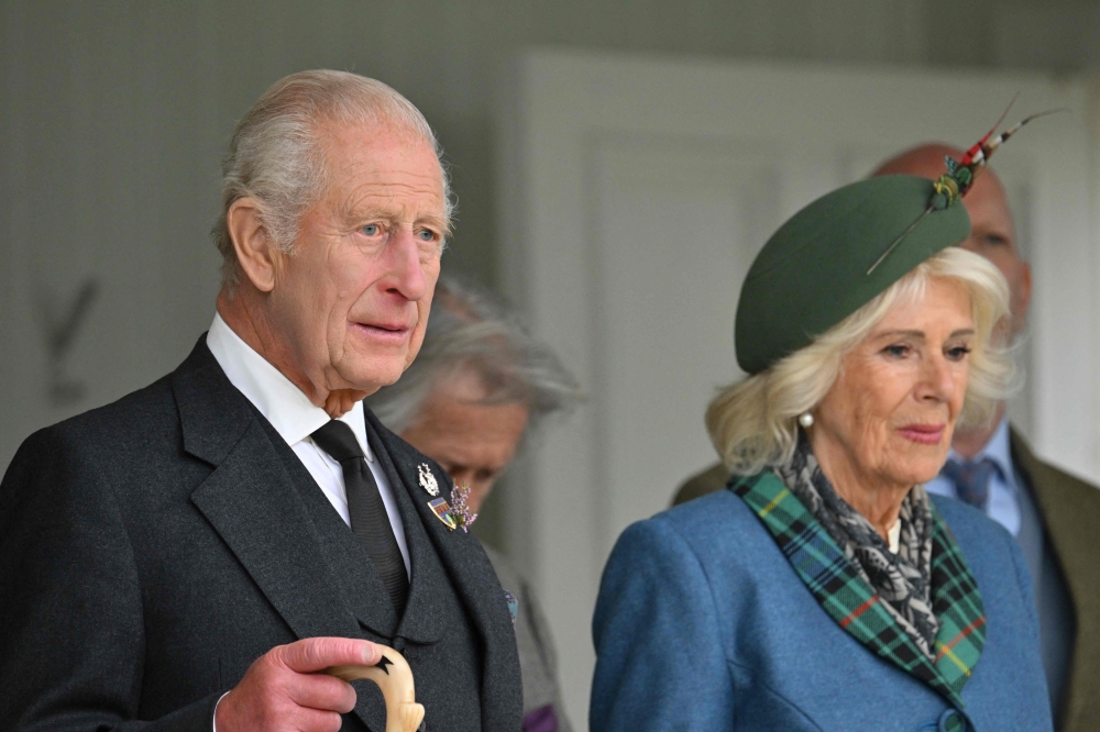 King Charles III and Queen Camilla attend the annual Braemar Gathering in Braemar, central Scotland, September 6, 2025. — AFP pic