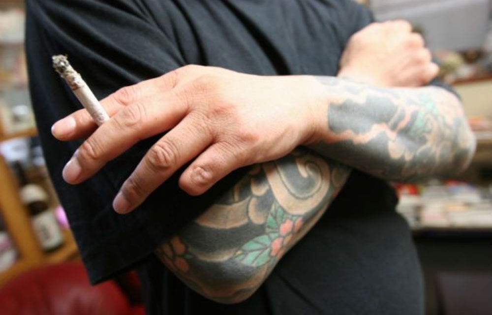Image is for illustration purposes only. The viral Japanese service sent tattooed men to hush bullies, mistresses, and marital disputes — until it suddenly shut down. —  Reuters file pic