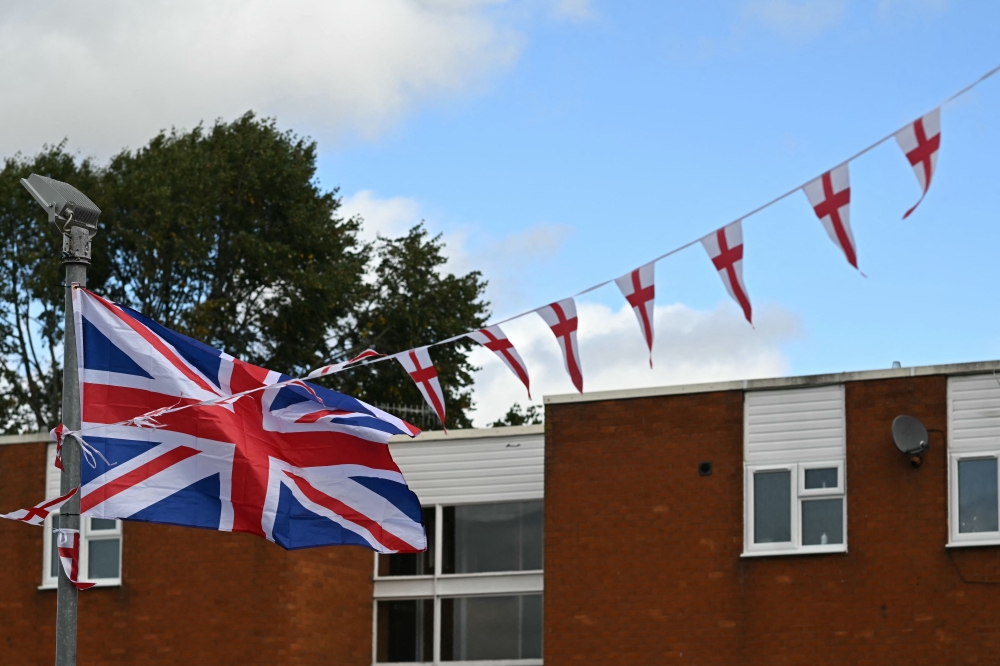 In recent years the flag has multiplied across housing estates, roundabouts and street corners. The timing has coincided with rising attacks on minorities. — AFP pic