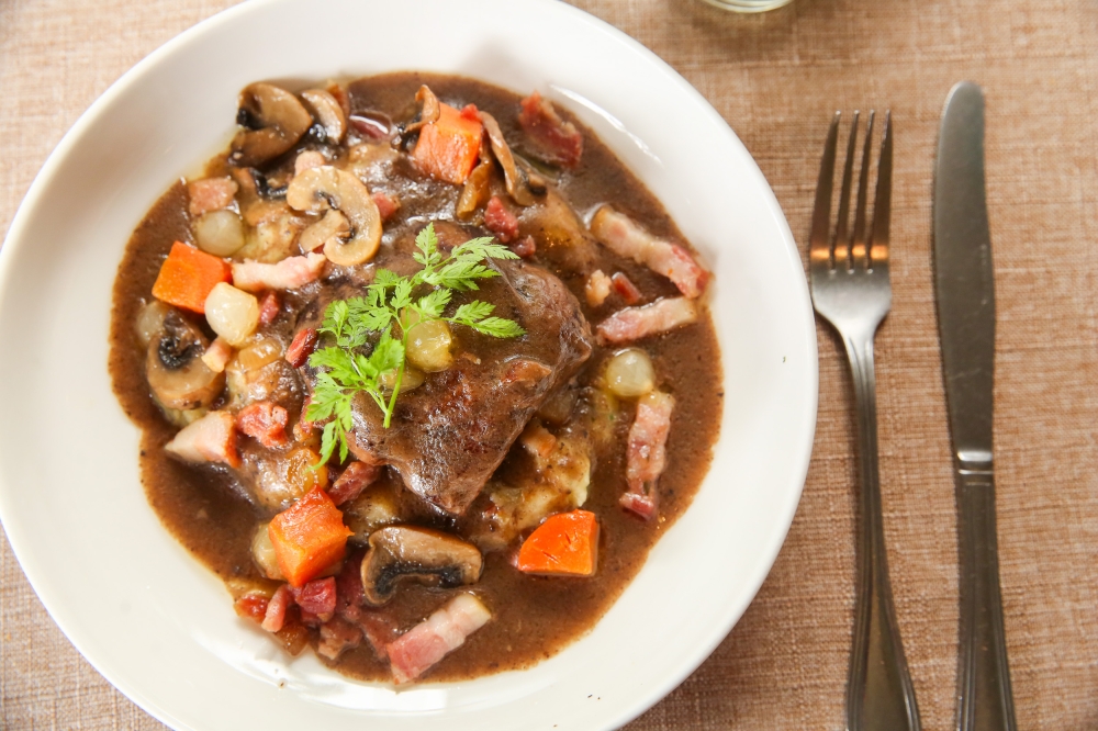 Iberico Pork Bourguignon features slow cooked Iberico pork in red wine with a tender texture. — Picture by Choo Choy May