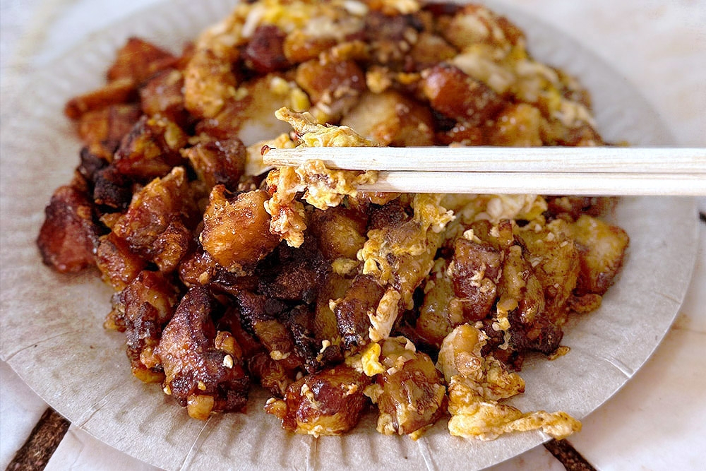 The soft egg curds are formed when fried quickly over high heat. — Picture by CK Lim