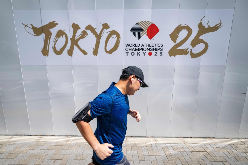 The marathons and 35km race walks at the World Athletics Championships in Tokyo will start half an hour earlier because of health risks posed by unseasonably hot weather. — AFP pic