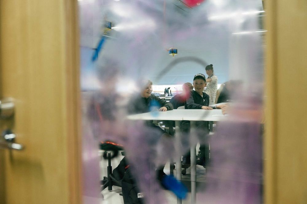 Students of the class 9F react during a lesson of teacher Anneika Railila at Kungsvagens skola comprehensive Swedish-speaking school on August 21, 2025 in Sipoo, Finland. — AFP pic