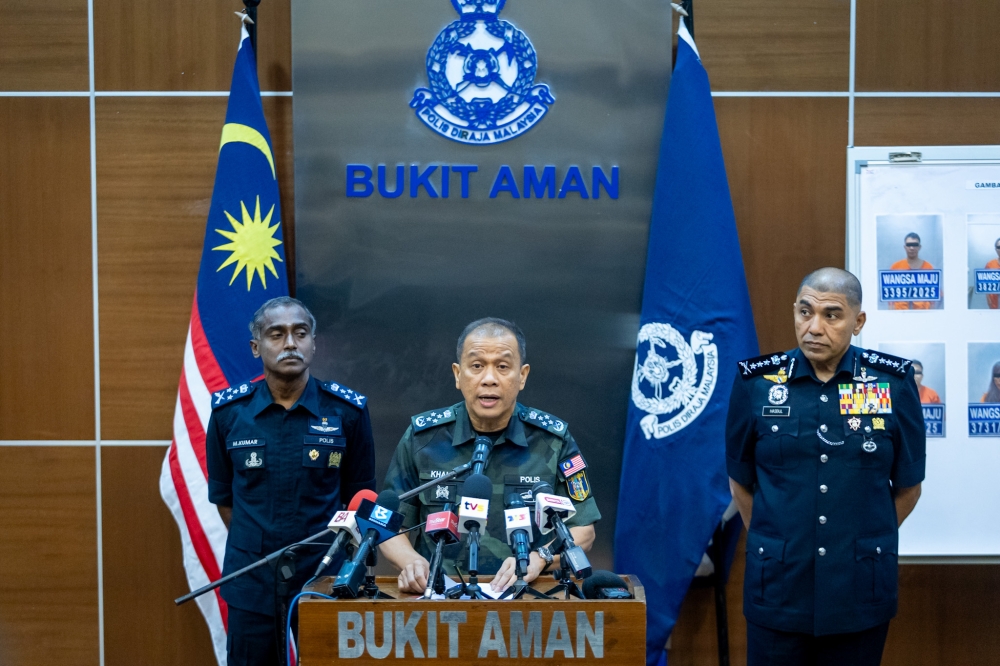 Inspector-General of Police Datuk Seri Mohd Khalid Ismail speaks during a press conference at the Bukit Aman police headquarters in Kuala Lumpur. — Picture by Firdaus Latif
